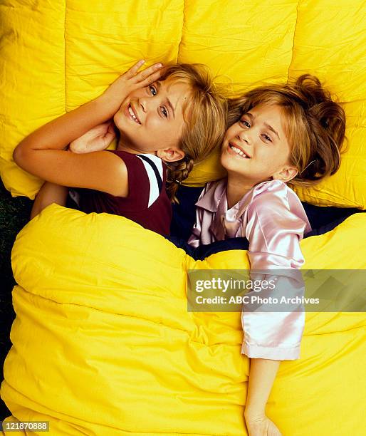 Olsen Twins Gallery - Shoot Date: July 20, 1998. MARY-KATE AND ASHLEY OLSEN