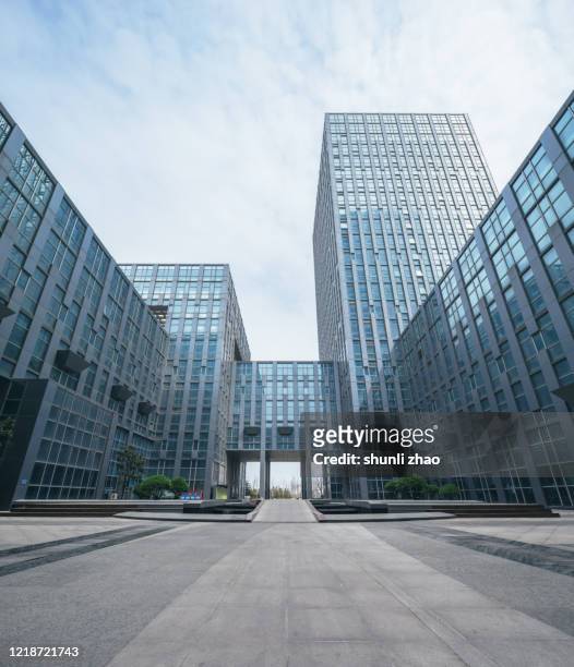 streets of urban financial district - low angle view street stock pictures, royalty-free photos & images