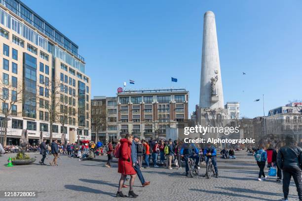 amsterdam war memorial - dam square stock pictures, royalty-free photos & images