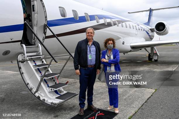 Philippe Bodson and Flemish minister Lydia Peeters pictured during a test flight of the 'Asl Fly Executive' program of ASL Group, offering luxurious...