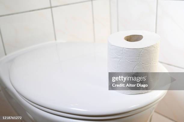 toilet paper on the toilet bowl. germany. - diarrhoea foto e immagini stock