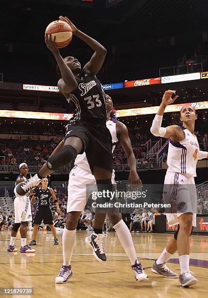 Sophia Young of the San Antonio Silver Stars lays up a shot against the Phoenix Mercury during the WNBA game at US Airways Center on August 20, 2011...