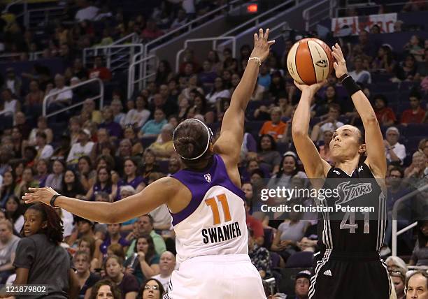 Tully Bevilaqua of the San Antonio Silver Stars puts up a shot during the WNBA game against the Phoenix Mercury at US Airways Center on August 20,...