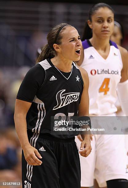 Becky Hammon of the San Antonio Silver Stars reacts during the WNBA game against the Phoenix Mercury at US Airways Center on August 20, 2011 in...