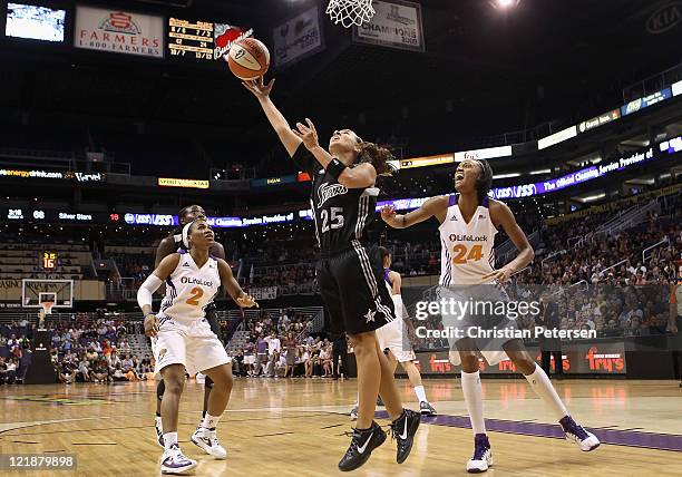 Becky Hammon of the San Antonio Silver Stars lays up a shot during the WNBA game against the Phoenix Mercury at US Airways Center on August 20, 2011...