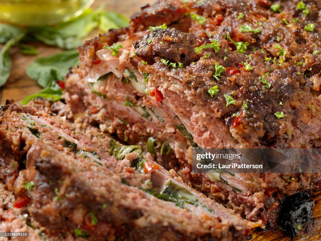 Sicilian Style Rolled Meatloaf with Deli Ham, Basil and Mozzarella