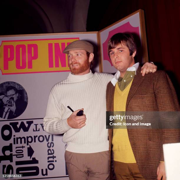 American singer and songwriter Mike Love and American musician, singer, songwriter, and record producer Brian Wilson of The Beach Boys pose for a...