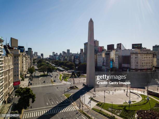 Aerial view of light traffic in 9 de Julio Avenue and the Obelisk on April 14, 2020 in Buenos Aires, Argentina. National government extended...