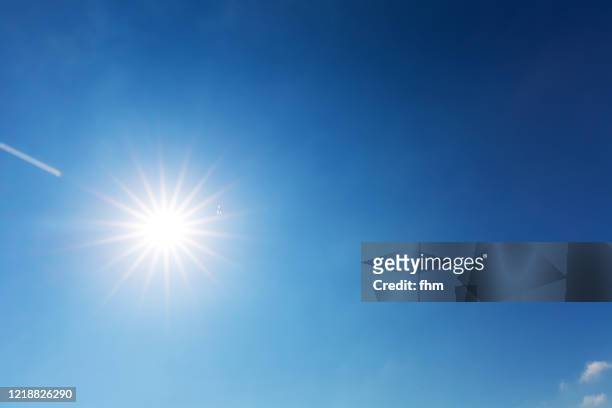 full bright sun in the sky - clear sky sun stock pictures, royalty-free photos & images