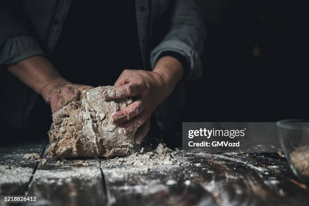 preparing healthy brown bread - kneading stock pictures, royalty-free photos & images