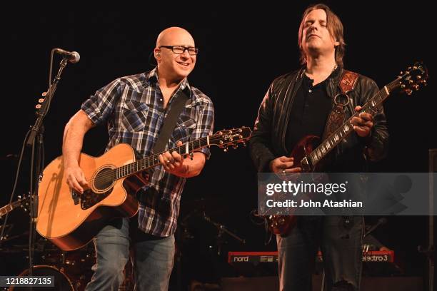 Guitarists Ken Block and Ryan Newell are shown performing on stage during a "live" concert appearance with Sister Hazel on September 12, 2009.