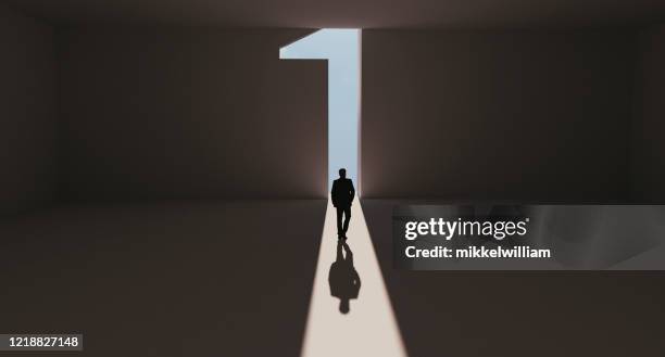 success for man who reaches first place and stands out from the crowd - 1 imagens e fotografias de stock