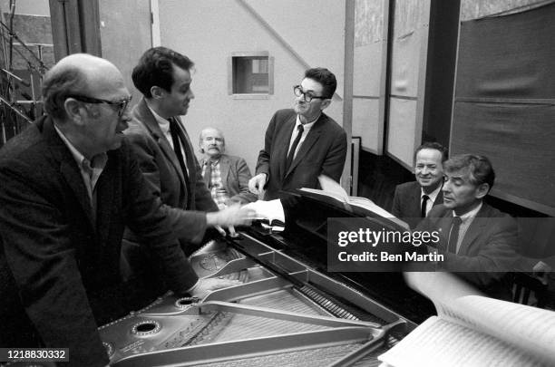 Leonard Bernstein and colleagues rehearse a tribute performance for slain Cradle Will Rock composer Marc Blitzstein at Philharmonic Hall, with...