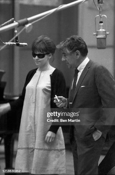 Leonard Bernstein and Barbara Harris rehearse a tribute performance for slain Cradle Will Rock composer Marc Blitzstein at Philharmonic Hall, with...