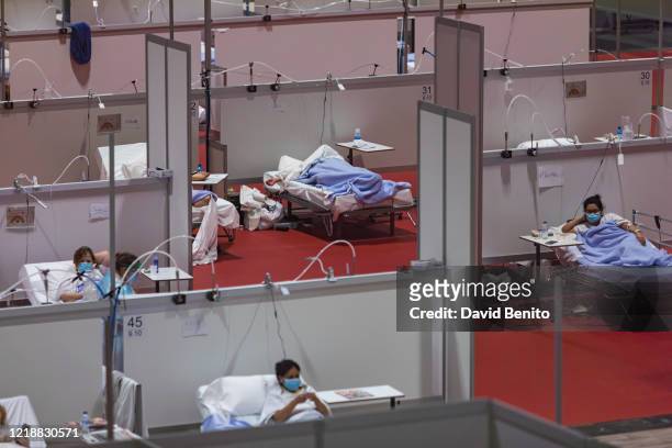 General view of the interior of ward 9 with coronavirus patients in the COVID-19 IFEMA Hospital on April 14, 2020 in Madrid, Spain. Spain is...