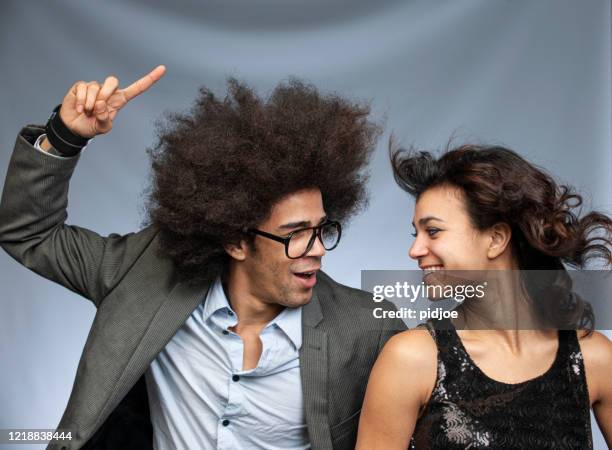 dancing young couple - fashion suit stock pictures, royalty-free photos & images