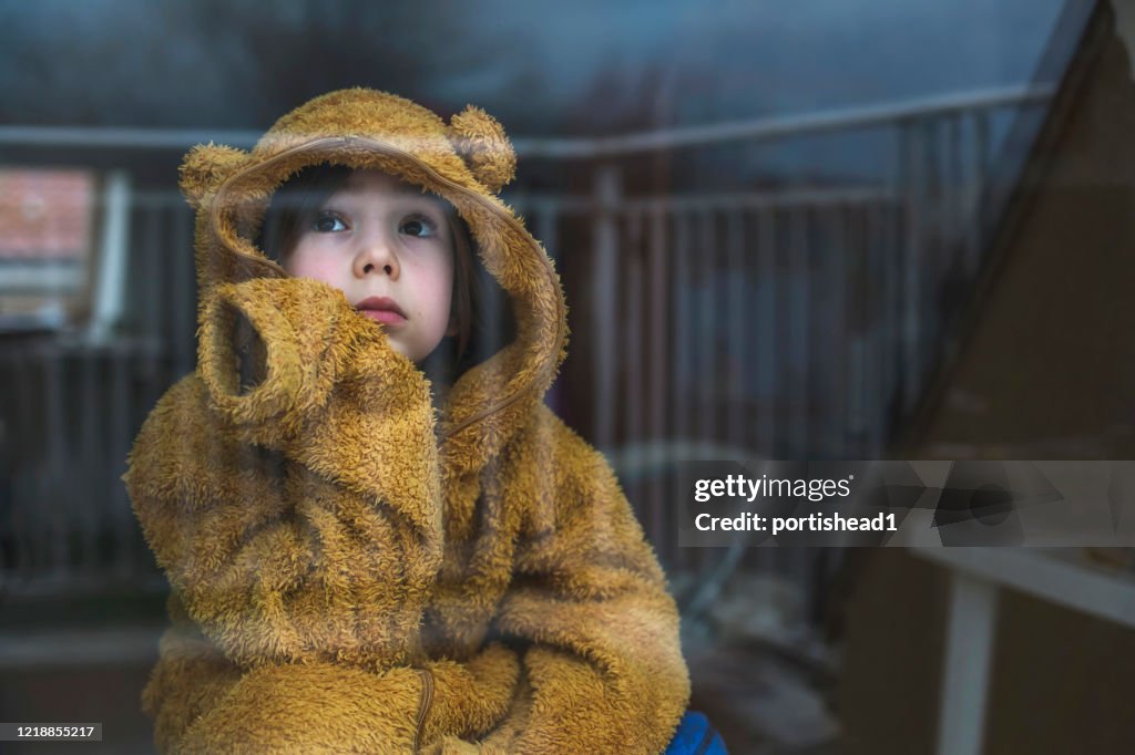 Sad child in isolation at home