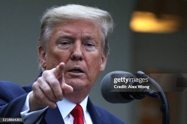 President Donald Trump speaks during the daily briefing of the White House Coronavirus Task Force in the Rose Garden at the White House April 14,...