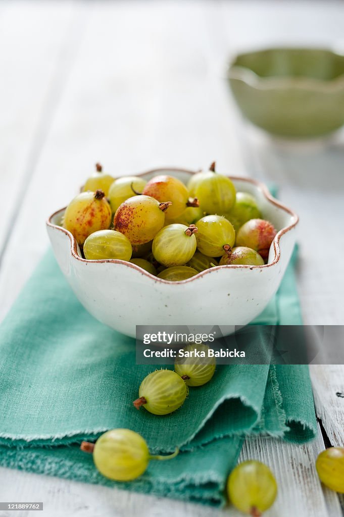 Gooseberries in white bowl