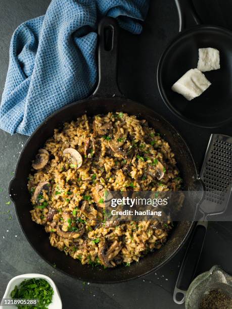 healthy vegan mushroom risotto - risotto stock pictures, royalty-free photos & images