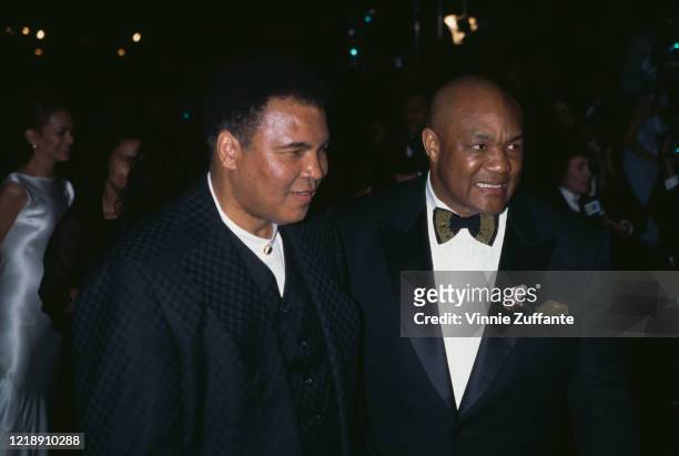 American heavyweight boxers Muhammad Ali and George Foreman attend the Vanity Fair Oscars Party, held at Morton's Restaurant in West Hollywood,...