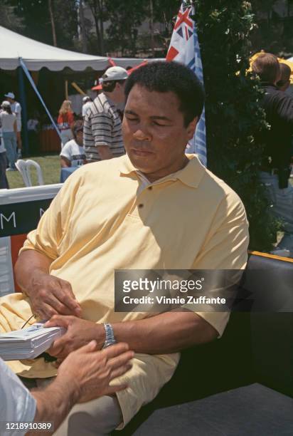 American heavyweight boxer Muhammad Ali attends the Nancy Davis Annual Race to Erase MS at UCLA Drake Stadium in Beverly Hills, California, June 1996.