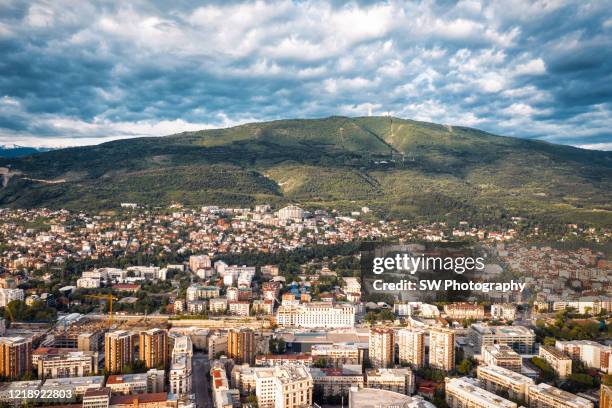 skopje cityscape and the mountain range - skopje stock pictures, royalty-free photos & images