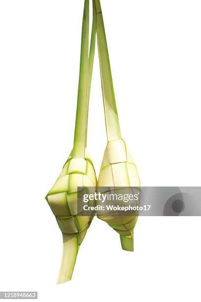 close-up of ketupats over white background - ketupat stock pictures, royalty-free photos & images