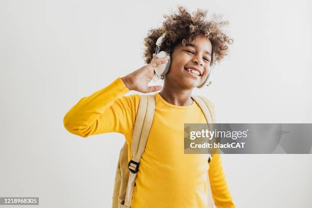 portrait of young african american girl - kid listening stock pictures, royalty-free photos & images