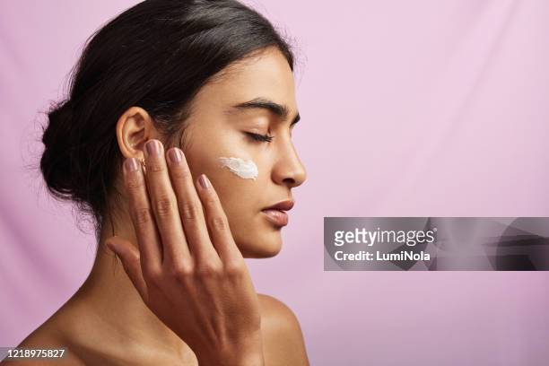 nothing feels better than moisturized skin - skin stock pictures, royalty-free photos & images