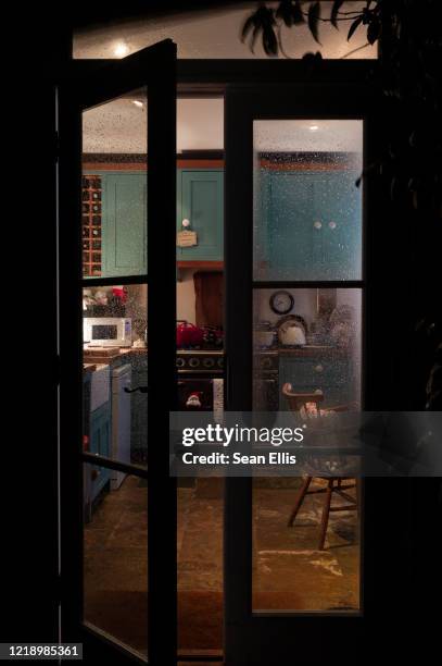 home kitchen on a winter night - on the outside looking in stock pictures, royalty-free photos & images