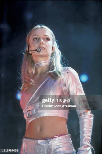 Singer, dancer, actress, and model Britney Spears is shown performing on stage during a "live" concert appearance on June 21, 2000. "n