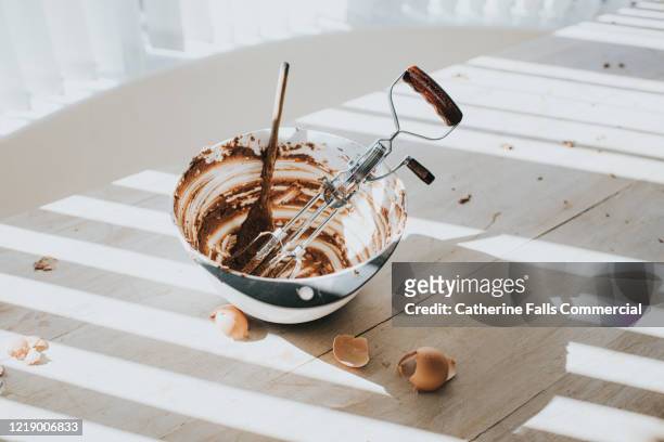 mixing bowl and baking mess - dirty oven stock pictures, royalty-free photos & images