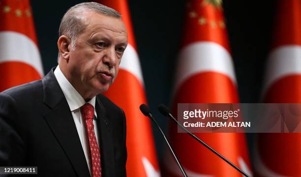 Turkish President Recep Tayyip Erdogan delivers a speech following a cabinet meeting, in Ankara, on June 9, 2020.