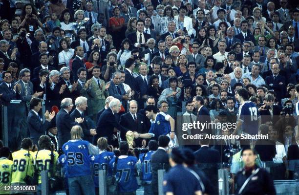 Diego Armando Maradona of Argentina awarded by the Pres of the Italian Republic Francesco Cossiga as second place, after the FIFA World Cup Final...