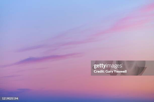 wispy clouds in the sky - multi colored skirt bildbanksfoton och bilder