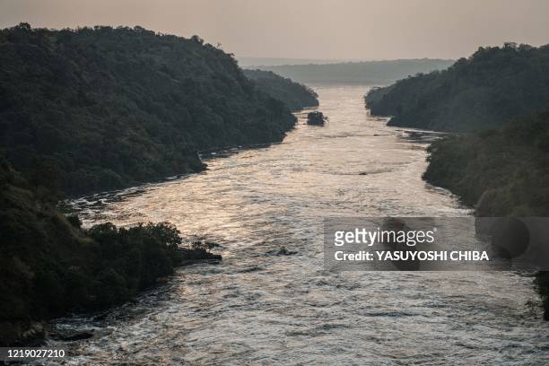 The view of the Victoria Nile from the top of the Murchison Falls, one of the majestic natural sites in Africa where the government has a plan to...
