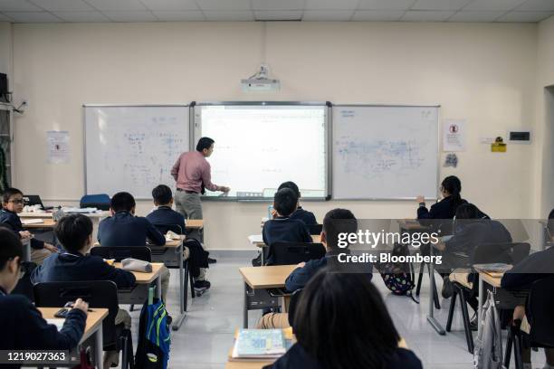 Students attend a mathematics class at the Vinschool, operated by Vingroup JSC, in Hanoi, Vietnam, on Thursday, Dec. 5, 2019. The Vingroup umbrella...