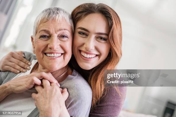 femininity - cheek-to-cheek stock pictures, royalty-free photos & images