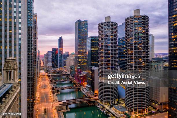 aerial view of empty chicago riverwalk during covid-19 pandemic - chicago skyscraper stock pictures, royalty-free photos & images