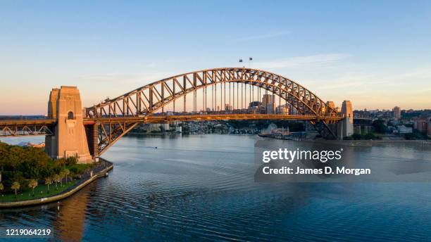 The Sydney Harbour Bridge during sunrise in the middle of the COVID-19 pandemic looks eerily quiet on April 10, 2020 in Sydney, Australia.