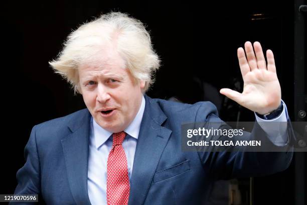 Britain's Prime Minister Boris Johnson leaves 10 Downing Street in central London on June 10, 2020 to attend Prime Minister's Questions in the Houses...