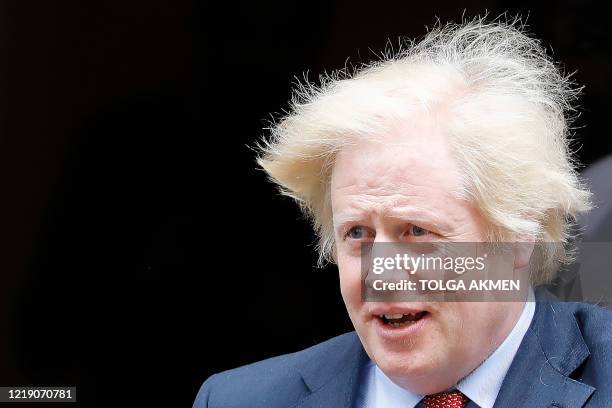 Britain's Prime Minister Boris Johnson leaves 10 Downing Street in central London on June 10, 2020 to attend Prime Minister's Questions in the Houses...