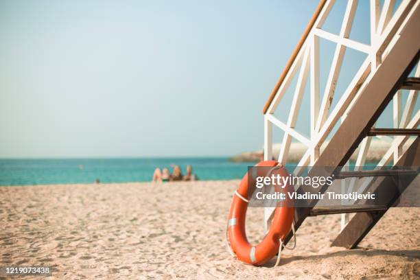 lifeguard float on the beach - cabina del guardaspiaggia foto e immagini stock
