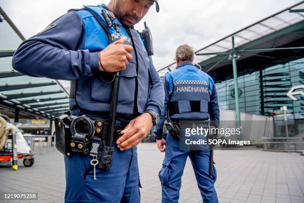 Or Special Enforcement Officers seen with a baton and pepper spray while on duty during the Coronavirus pandemic rules enforcement which consists of...