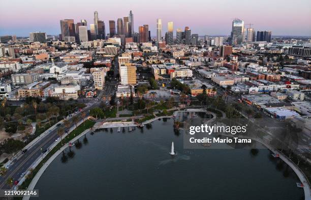 An aerial view shows MacArthur Park and downtown in the midst of the coronavirus pandemic, on April 15, 2020 in Los Angeles, California....