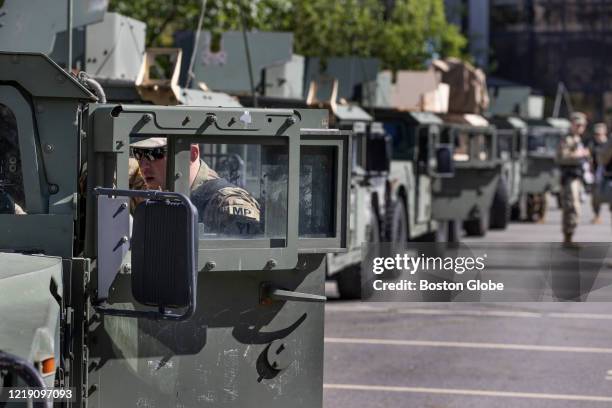 The Massachusetts National Guard heads out of a parking lot near South Station in Boston on June 8, 2020. National Guard were deployed in Boston to...