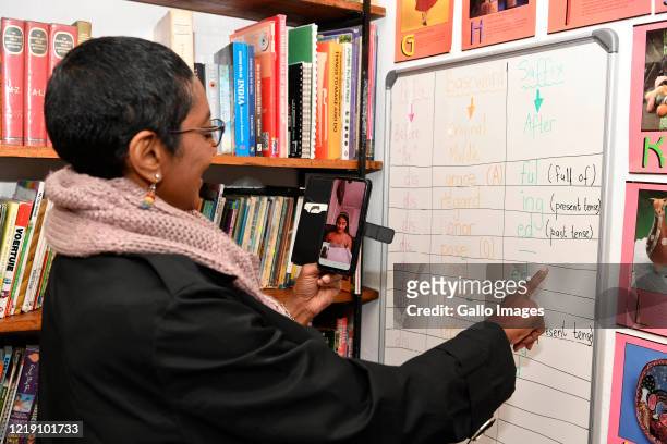 Ponnie Moodley educates her online student during an interview on June 09, 2020 in Johannesburg, South Africa. The veteran educator of 31 years has...