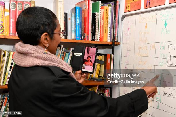 Ponnie Moodley educates her online student during an interview on June 09, 2020 in Johannesburg, South Africa. The veteran educator of 31 years has...
