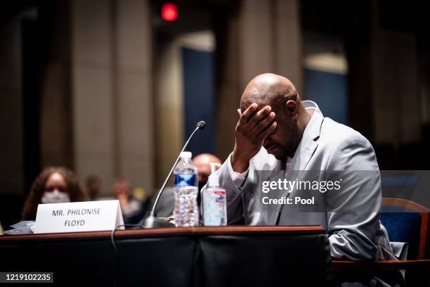 Philonise Floyd, brother of George Floyd, tears up while testifying during a House Judiciary Committee at a hearing on police accountability on...